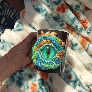Black Mug with Dragon Eye Design